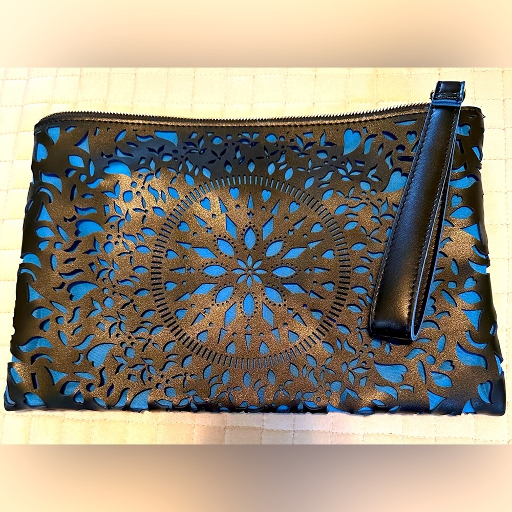 Amici blue and black burn out faux leather clutch with design NWOT